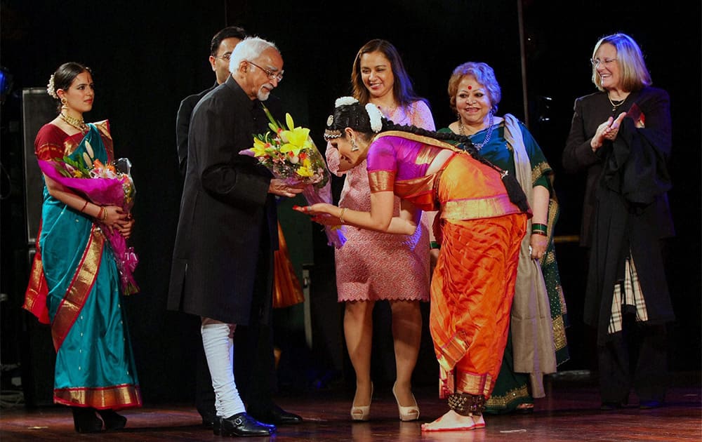 Vice President Hamid Ansari and his Peruvian counterpart Nadine Heredia Alarcón de Humala interacting with Indian classical dancers during the inauguration of `Festival of india` at Lima, Peru.