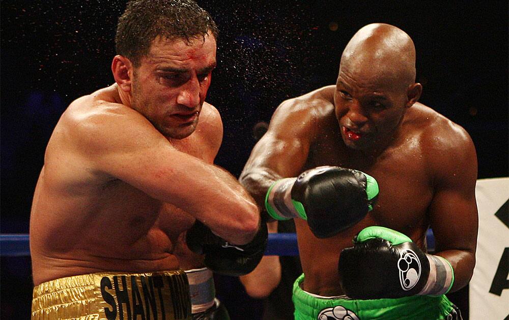 Bernard Hopkins, right, of Philadelphia, Penn. lands a punch on Karo Murat of Germany during the eleventh round of IBF Light Heavyweight Title in Atlantic City, N.J.