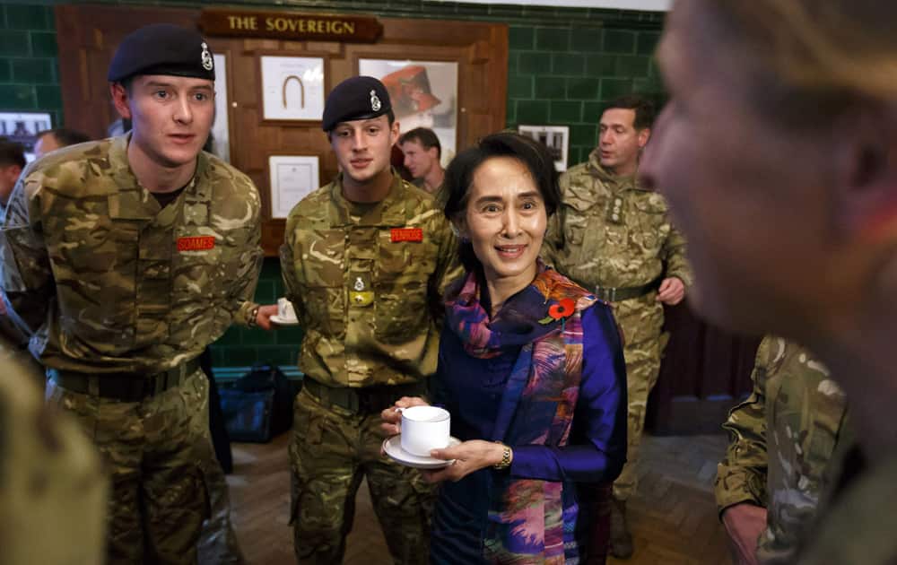 Burmese opposition leader Aung San Suu Kyi joins officer cadets for tea, at the Royal Military Academy Sandhurst in Surrey, England.