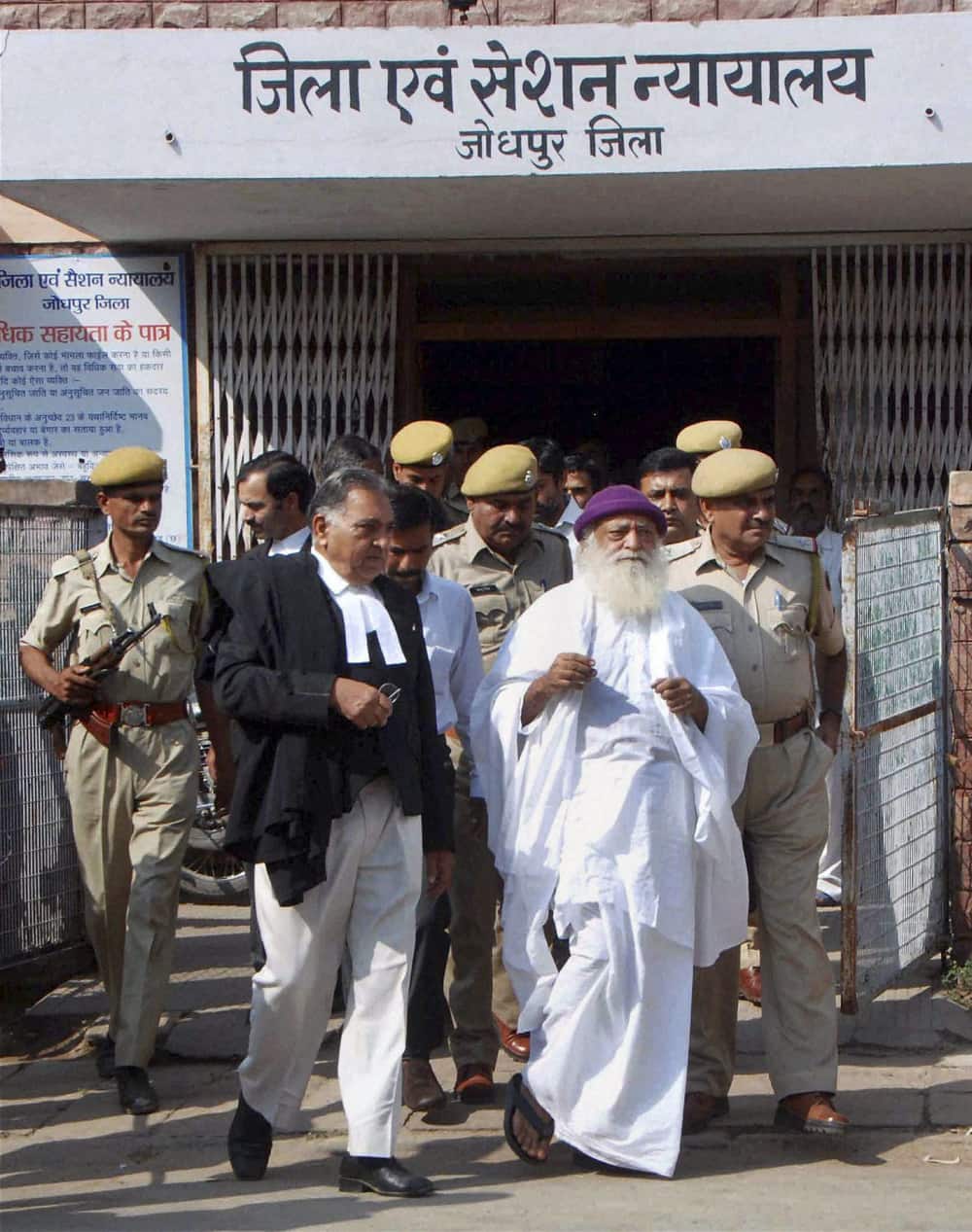 Asaram Bapu, an accused in a sexual assault case is being produced by police before the District and Sessions court in Jodhpur.