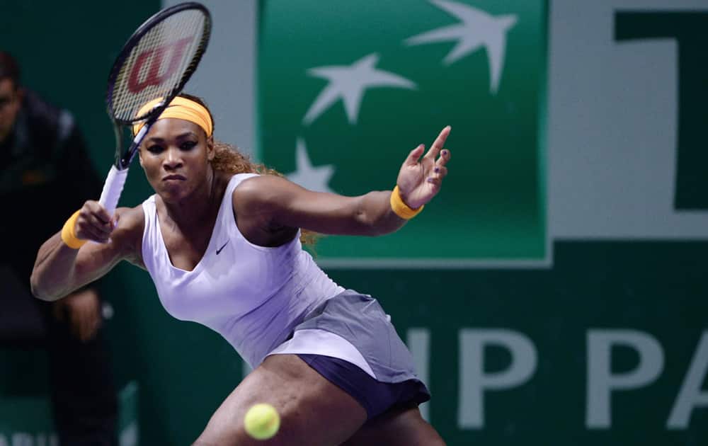 Serena Williams of the USA returns a shot to Petra Kvitova of Czech Republic during their tennis match at the WTA championship in Istanbul, Turkey.