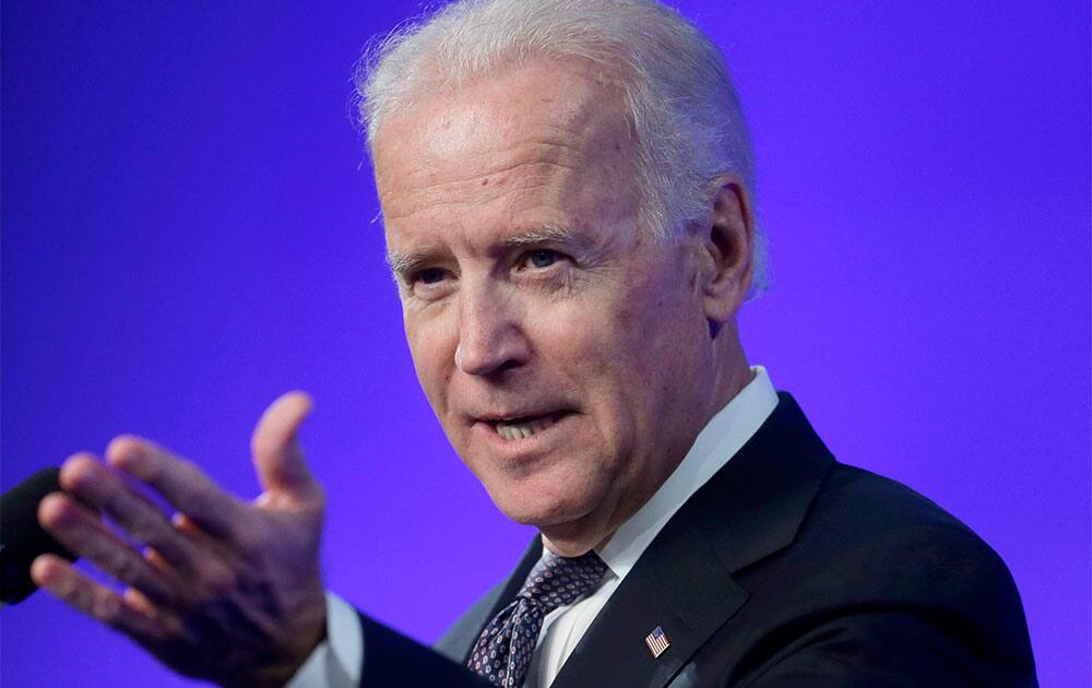 Vice President Joe Biden addresses an audience during a forum on mental health policies that marks the 50th anniversary of President John F. Kennedy`s signing of the Community Mental Health Act, at the JFK Library and Museum in Boston.