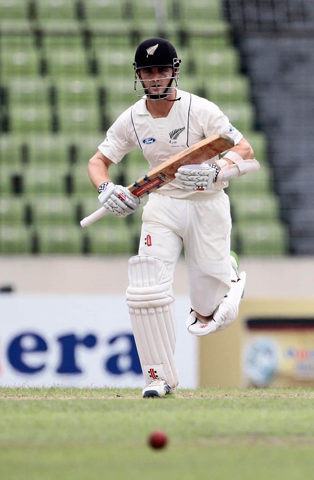 New Zealand’s Kane Williamson runs between the wickets on the third day of the second cricket test match against Bangladesh in Dhaka.