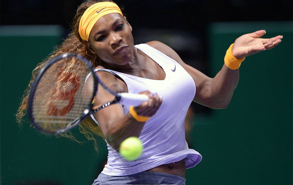 Serena Williams of the US returns a shot to Angelique Kerber of Germany during their tennis match at the WTA championship in Istanbul, Turkey.