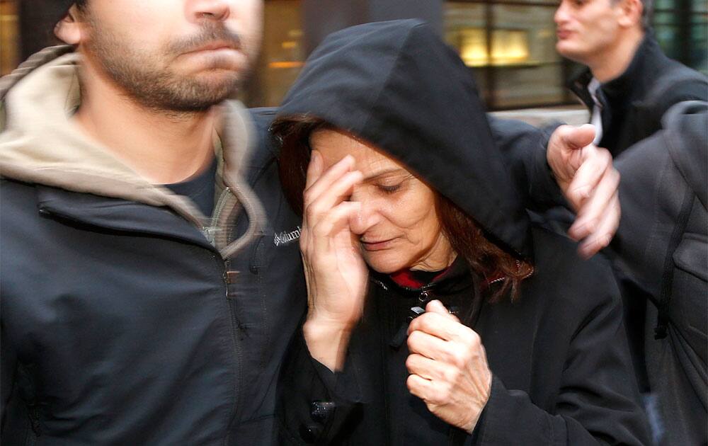 Rasmieh Yousef Odeh departs the federal courthouse after her initial appearance before US Magistrate Judge Michael Mason in Chicago.
