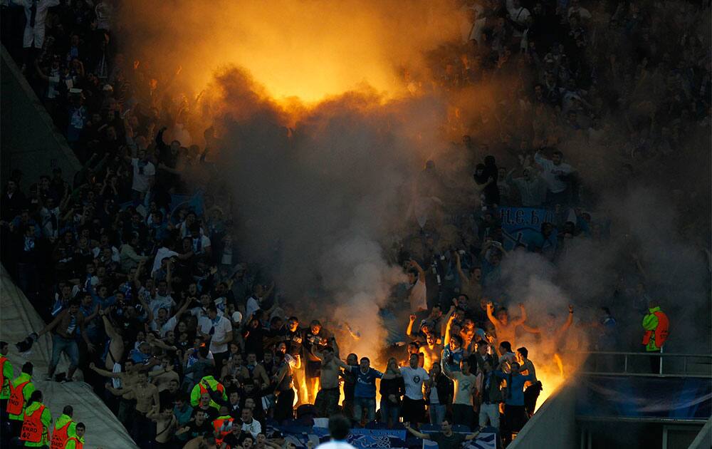 Zenit supporters celebrate their team`s goal during the Champions League group G soccer match between FC Porto and Zenit at the Dragao stadium in Porto, northern Portugal.