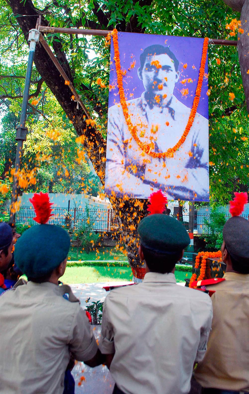 NCC cadets pay floral tribute to freedom fighter Ashfaqulla Khan at company garden on the occasion of his Birth Anniversary in Allahabad.