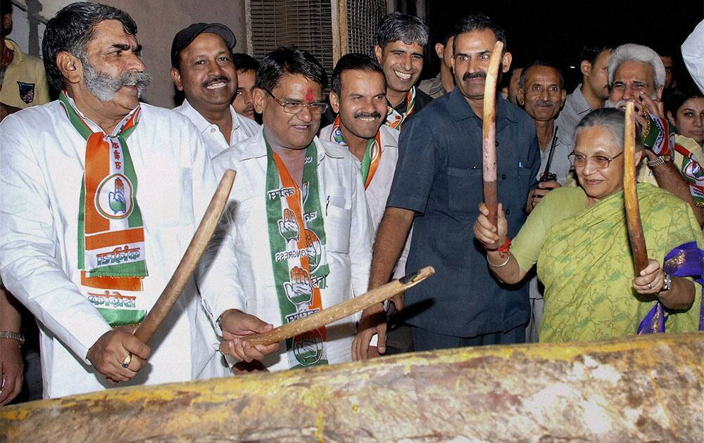 Delhi CM Sheila Dikshit launches Congress party`s Delhi Assembly poll campaign from Pilanji village in New Delhi.