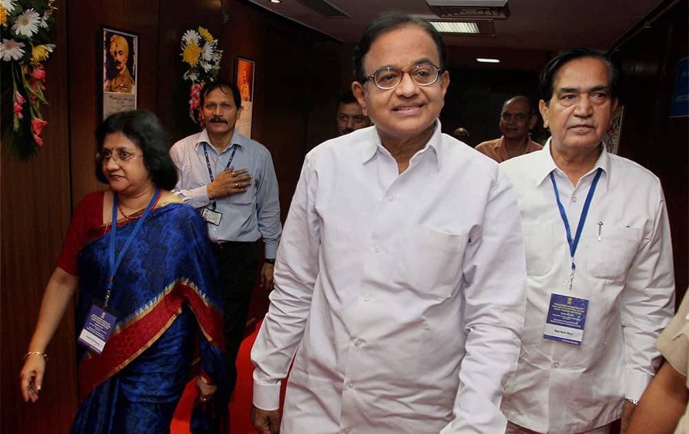 Finance Minister P Chidambaram flanked by SBI Chairman Arundhati Bhattacharya and MoS Namo Narain Meena during a meeting with the CMDs of Public Sector Banks and Financial Institutions in New Delhi.