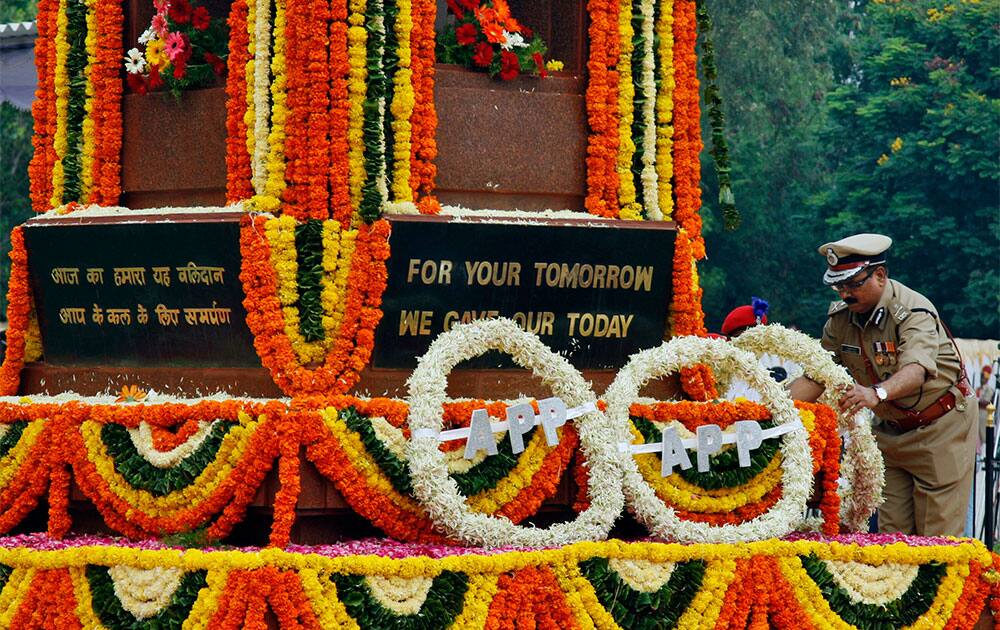 Andhra Pradesh State Director General of Police B. Prasada Rao places a wreath as a sign of respect to police martyrs on the occasion of Police Commemoration Day in Hyderabad.
