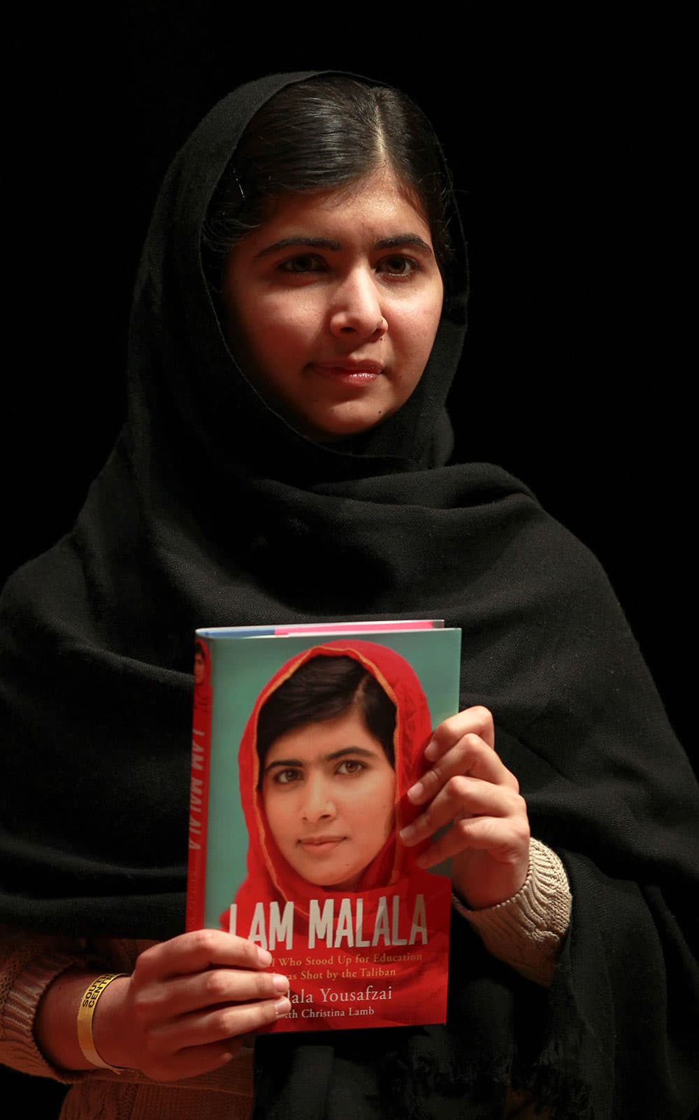 Malala Yousafzai during a photocall at the Queen Elizabeth Hall in London to launch her memoir, I Am Malala. The Pakistani schoolgirl shot in the head by a Taliban gunman for advocating education for girls in her country has been recovering in Britain.
