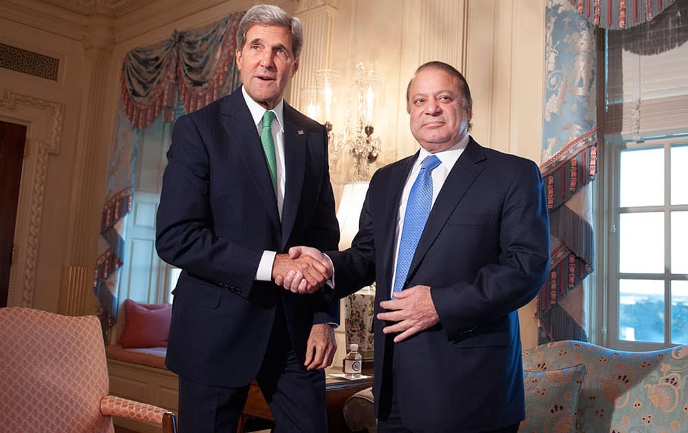 Secretary of State John Kerry shake hands with Pakistan Prime Minister Nawaz Sharif prior to their meeting at the State Department in Washington.
