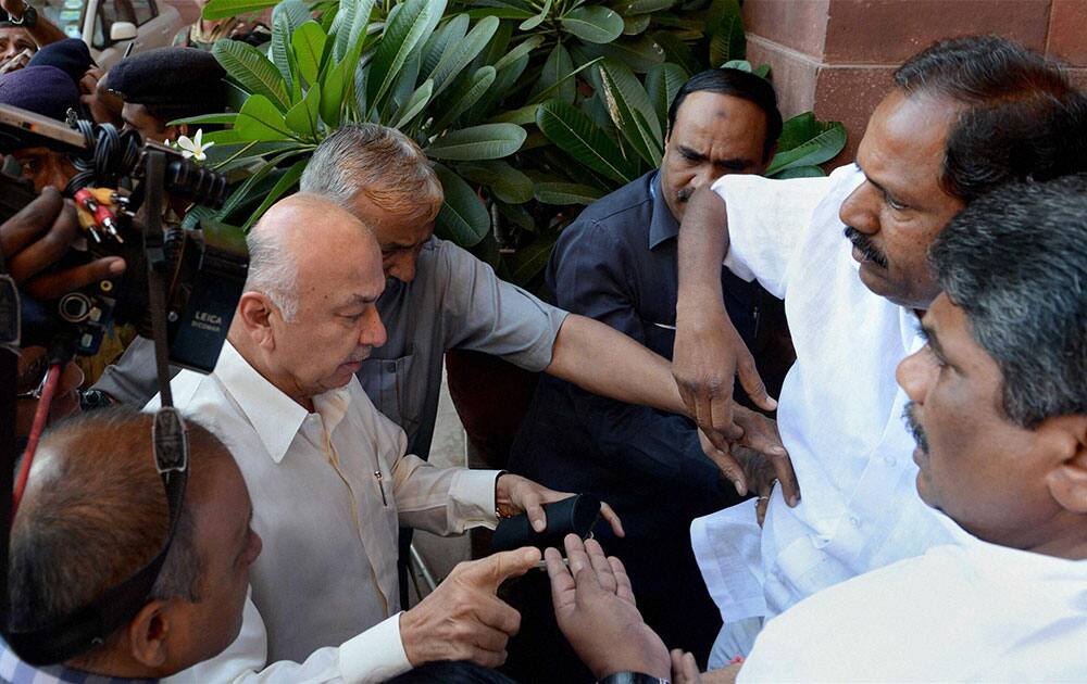 Union Home Minister arrives for GOM at his office as TDP MPs protest over Telangana issue during a meeting of the GoM, set up to look into the bifurcation of Andhra Pradesh, at North Block in New Delhi.