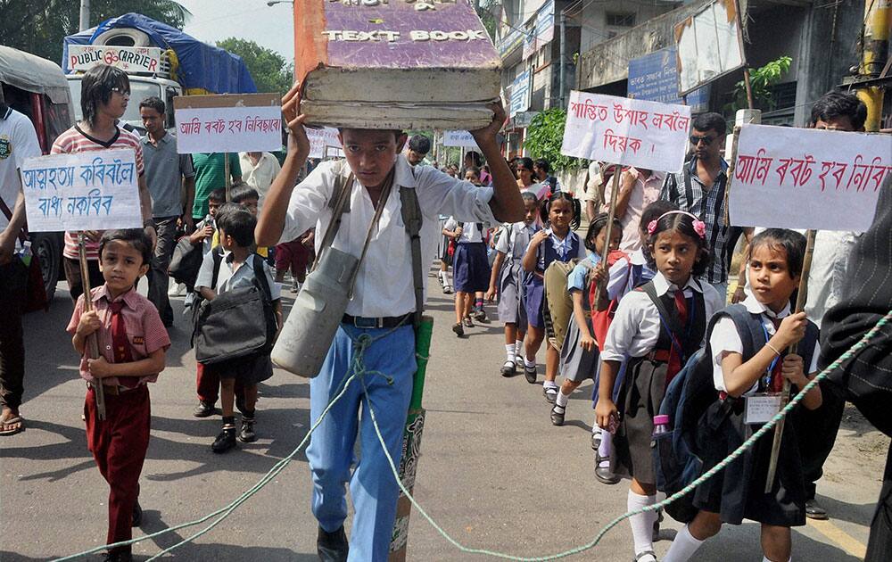 School students demonstrate an awareness rally on education organized by a cultural organization in Guwahati.