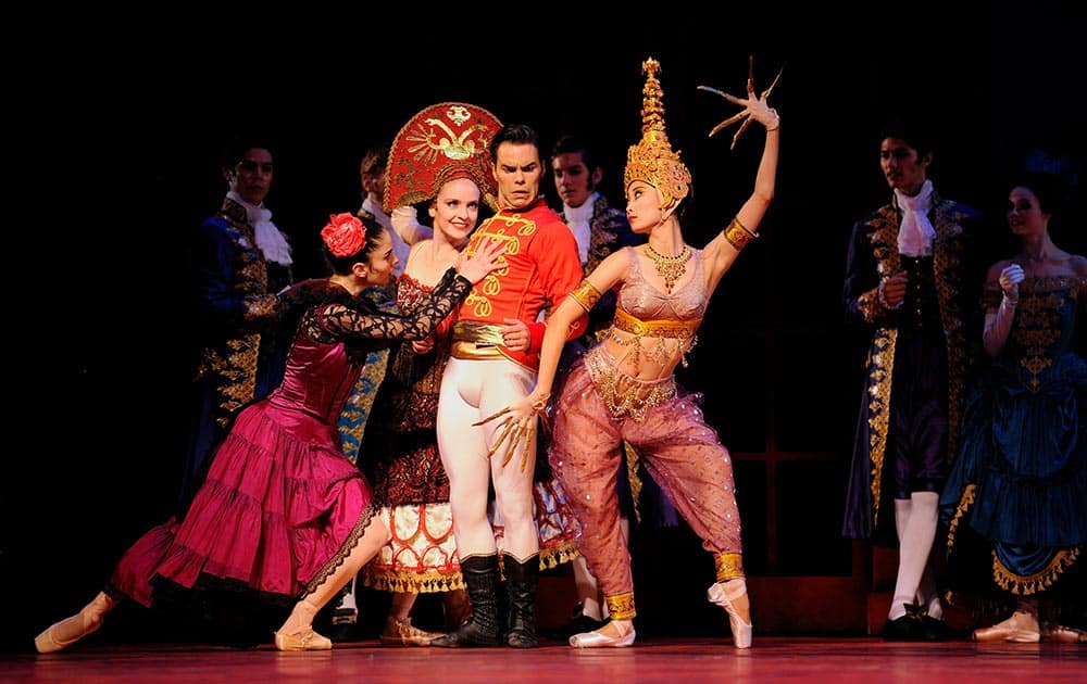 This 2013 photo provided by the San Francisco Ballet shows, from left, Dores Andre, Sasha De Sola, Joan Boada and Wan Ting Zhao, in Wheeldon`s