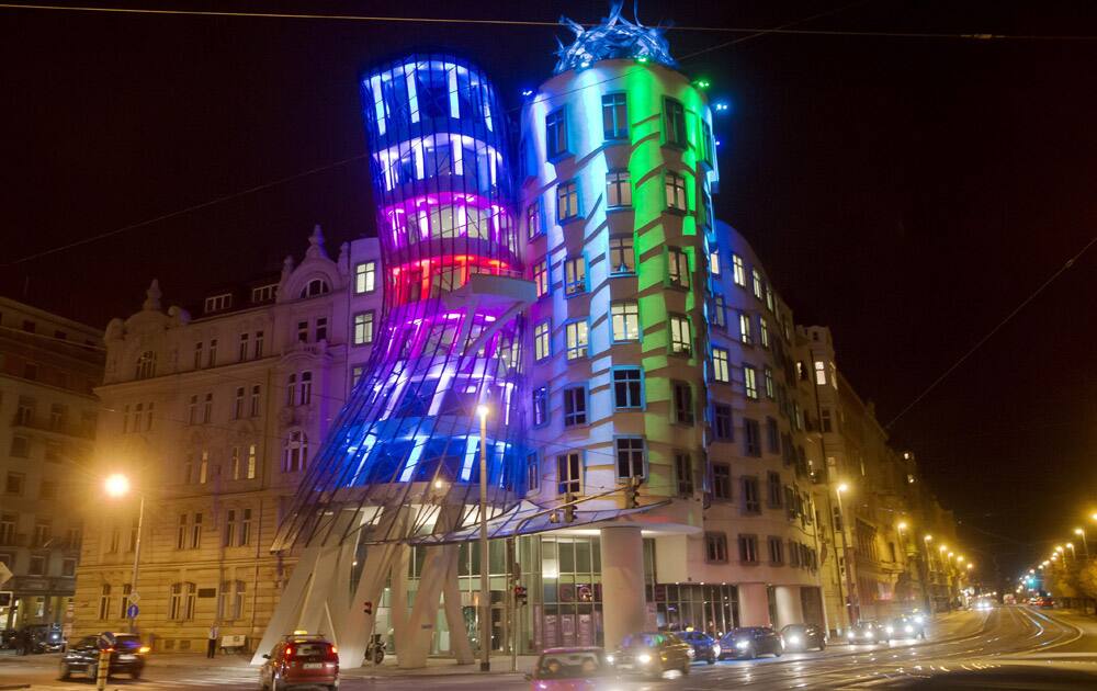 Lights are projected onto the Dancing House in Prague, Czech Republic. Numerous buildings in Prague are lit up for the Festival of Lights in the next days.