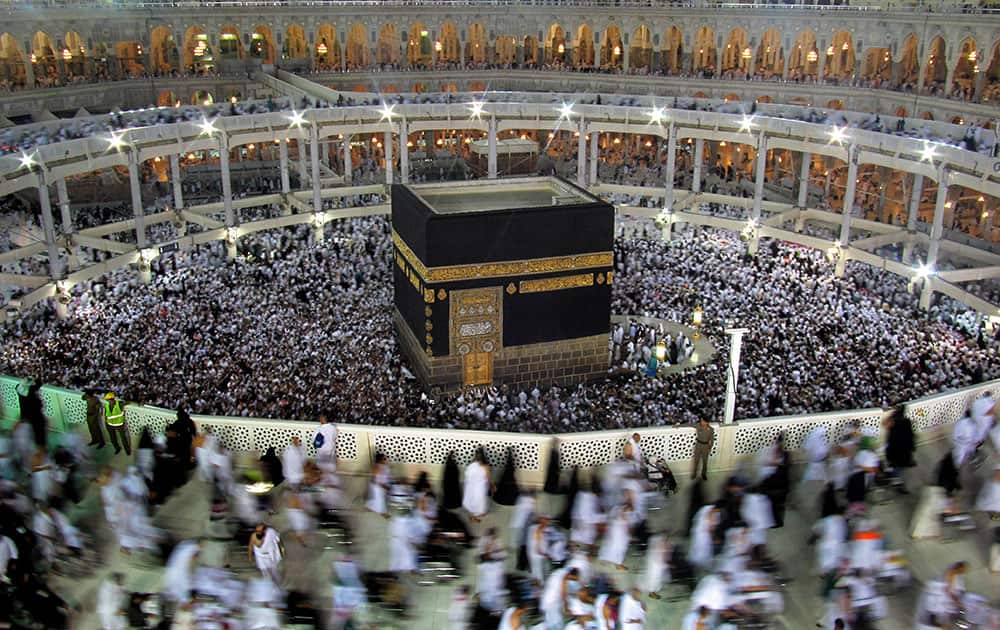 Muslim pilgrims circle the Kaaba as they pray inside the Grand Mosque during the hajj, or pilgrimage, in the Muslim holy city of Mecca, Saudi Arabia.