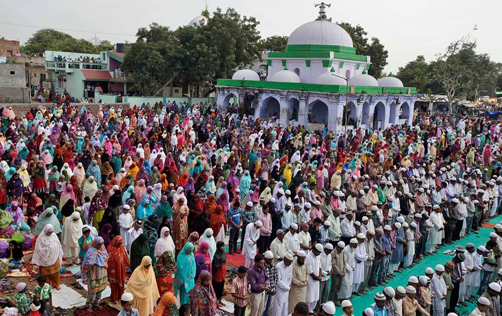 Indian Muslims pray during a special prayer at Qutub-e-Alam mosque to mark the beginning of Hajj pilgrimage to the holy city of Mecca in Saudi Arabia, in Ahmedabad.