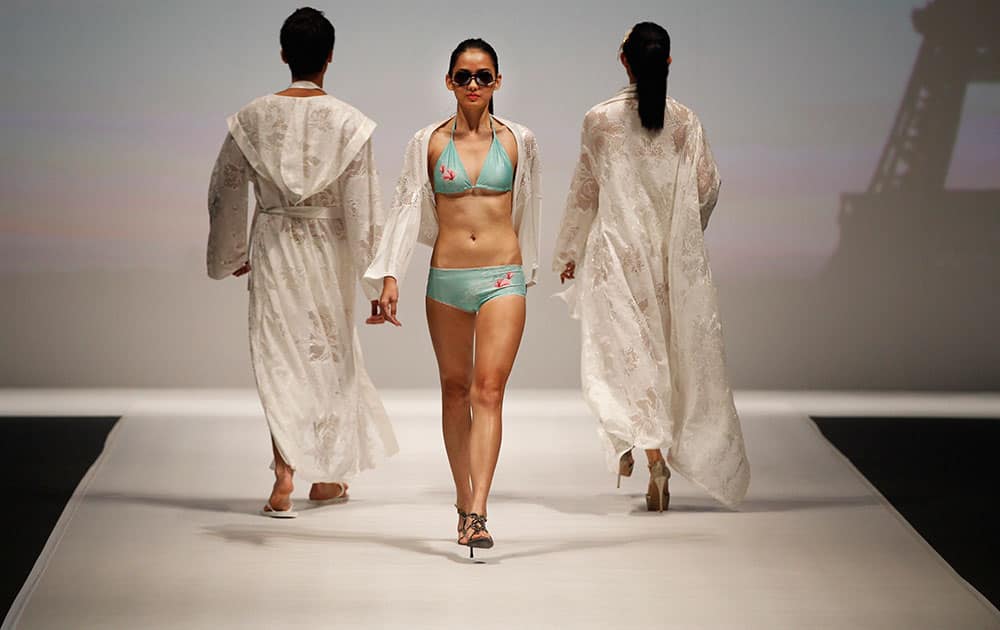 Models display creations by Hong Kong designer brand Mondovi Lingerie Couture during the Taipei IN Style fashion show in Taipei, Taiwan.