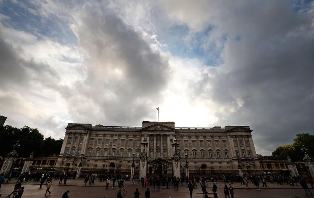 A view of Buckingham Palace in central London. British police arrested a man with a knife after he tried to dart through a gate at Buckingham Palace in London.