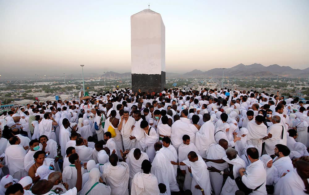 Muslim pilgrims pray on a rocky hill called the Mountain of Mercy, near the holy city of Mecca, Saudi Arabia.