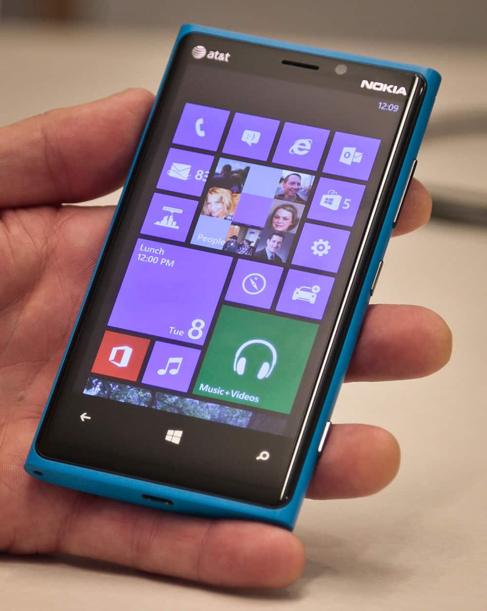Greg Sullivan, director for Microsoft Windows phone, shows a Nokia phone with new software during an interview.
