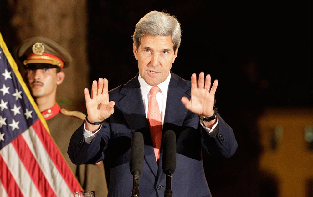 US Secretary of State John Kerry speaks during a joint news conference with Afghanistan`s President Hamid Karzai at the presidential palace in Kabul.