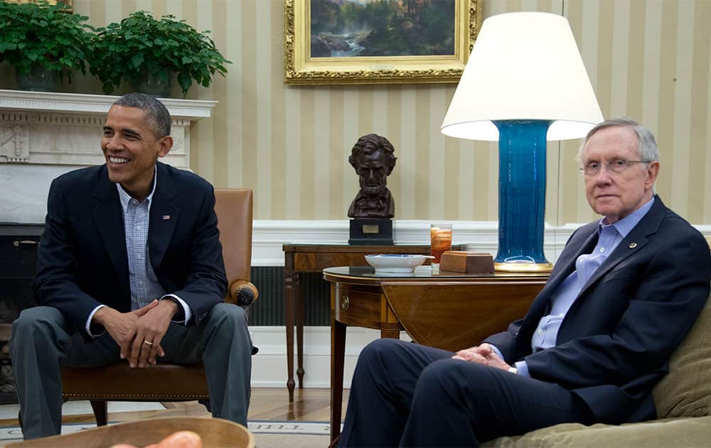 President Barack Obama, left, and Senate Majority Leader Harry Reid of Nev., meet with Sen. Patty Murray, D-Wash., Sen. Dick Durbin, D-Ill., and Sen. Charles Schumer, D-N.Y., in the Oval Office of the White House.