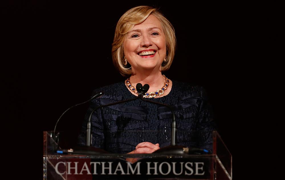 Former US Secretary of State Hillary Rodham Clinton, reacts, during the Chatham House Prize award ceremony in central London.