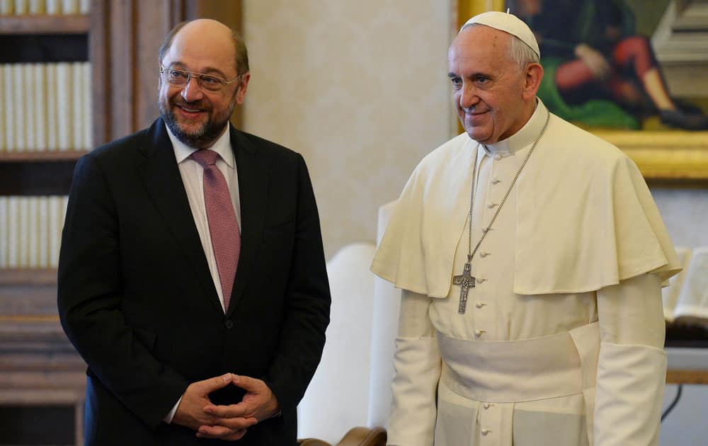 President of the European Parliament Martin Schulz and Pope Francis pose for photographers on the occasion of their private audience, at the Vatican.