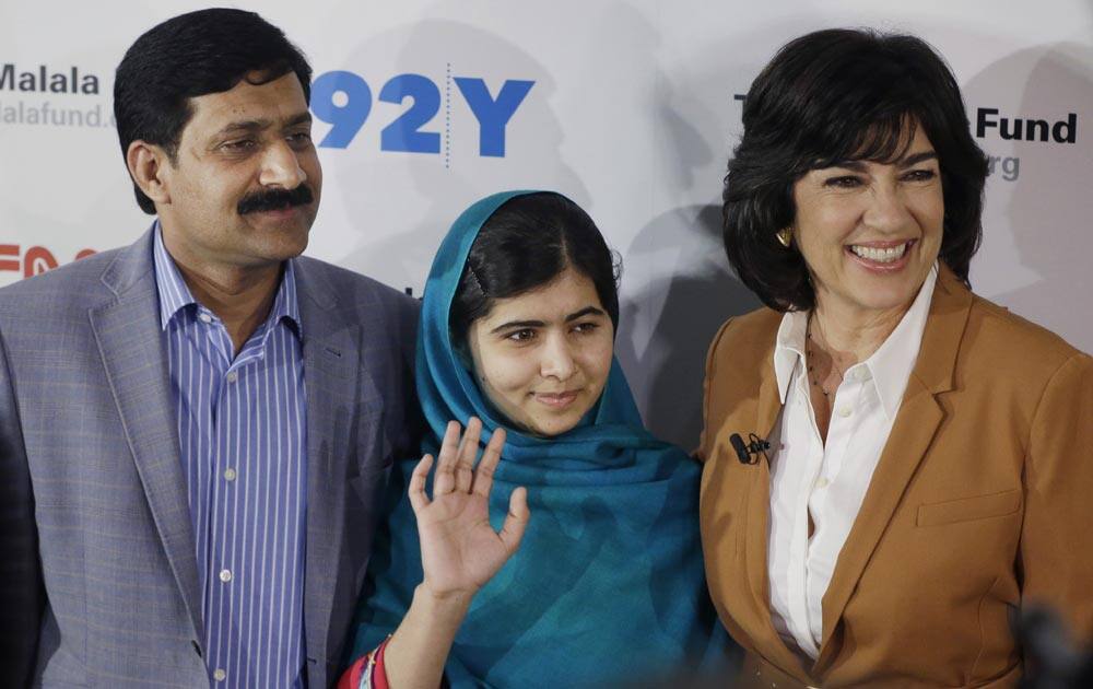 Malala Yousafzai, her father, Ziauddin Yousafzai and Christiane Amanpour pose for photographs, in New York.