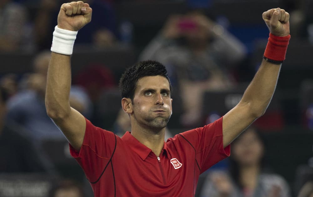 Serbia’s Novak Djokovic celebrates his win over Italy`s Fabio Fognini in their match at the Shanghai Masters tennis tournament at the Qizhong Forest Sports City Tennis Center in Shanghai, China.