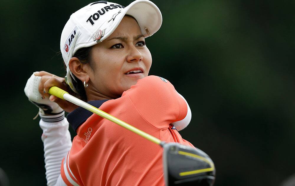 Japan`s Ai Miyazato watches her tee shot during her first round of the Malaysian LGPA event in Kuala Lumpur.