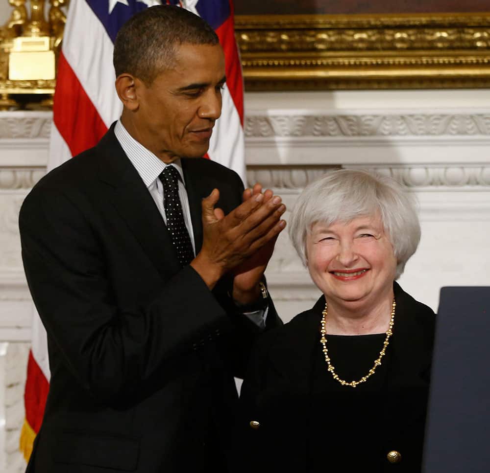 President Barack Obama stands with his nominee for the next Federal Reserve chair, Janet Yellen, currently vice chair of the Board of Governors of the Federal Reserve System, in the State Dining Room of the White House in Washington.