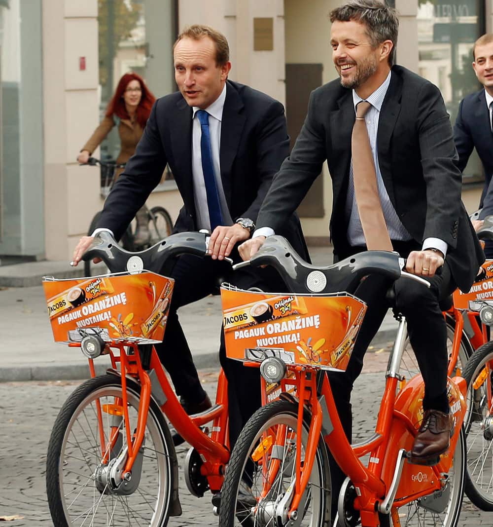 Denmark`s Crown Prince Frederik and Danish Minister for Climate, Energy and Building Martin Lidegaard,left, during the sightseeing tour around the old city in Vilnius, Lithuania.