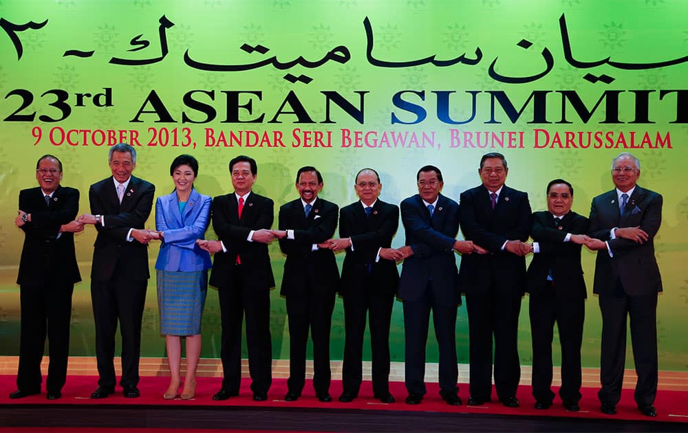 Leaders of the Association of Southeast Asian Nations (ASEAN) pose for a group photo session during ASEAN summit in Bandar Seri Begawan, Brunei.