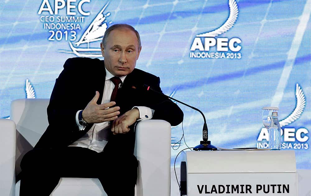 Russian President Vladimir Putin delivers his keynote address at the Asia-Pacific Economic Cooperation CEO Summit in Bali, Indonesia.