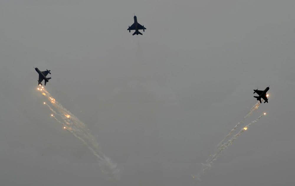 Indian Air Force (IAF) jets perform a display during Air Force Day at Hindon, on the outskirts of New Delhi.