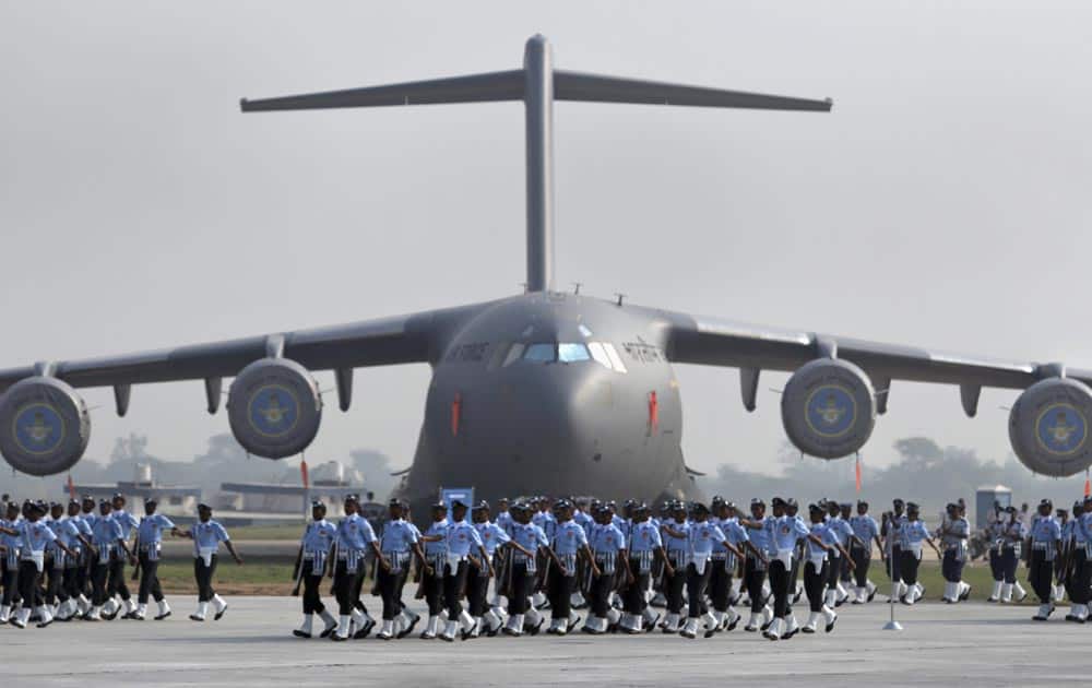 Indian Air Force (IAF) personnel march during parade rehearsals ahead of Air Force Day at Hindon, on the outskirts of New Delhi.