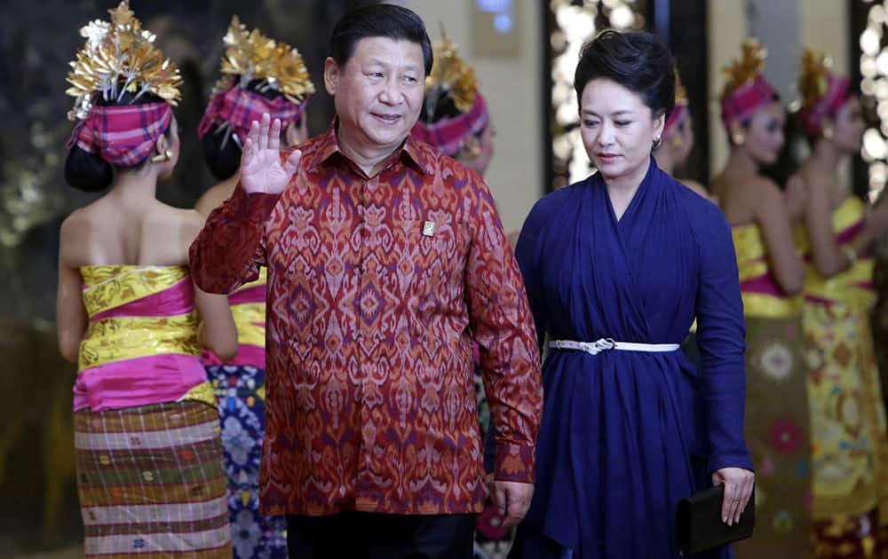 Chinese President Xi Jinping, wearing traditional Balinese
