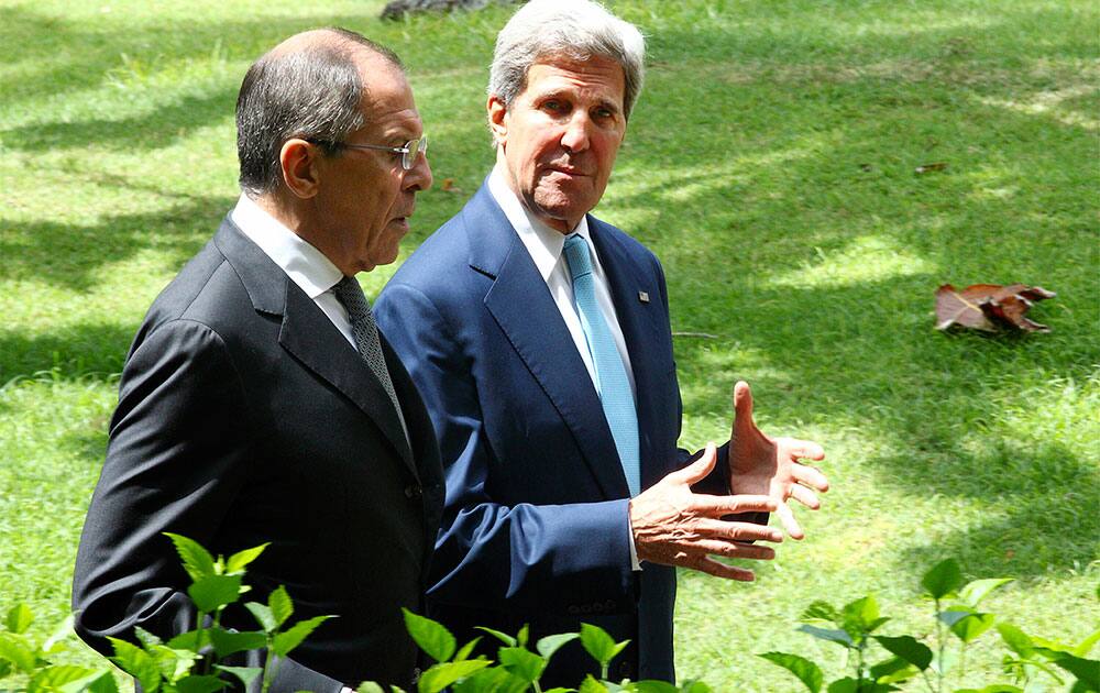 US Secretary of State John Kerry speaks with Russian Foreign Minister Sergey Lavrov during their bilateral meeting on the sidelines of the Asia-Pacific Economic Cooperation (APEC) summit in Bali.