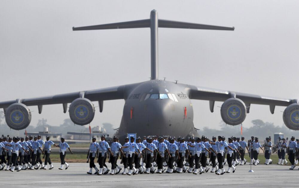 Indian Air Force (IAF) personnel march during parade rehearsals ahead of Air Force Day at Hindon, on the outskirts of New Delhi.