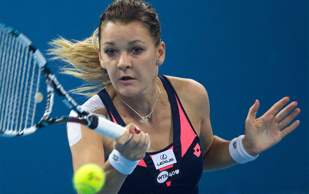 Agnieszka Radwanska of Poland returns a shot to Serena Williams of U.S. during the semifinal match of the China Open tennis tournament.
