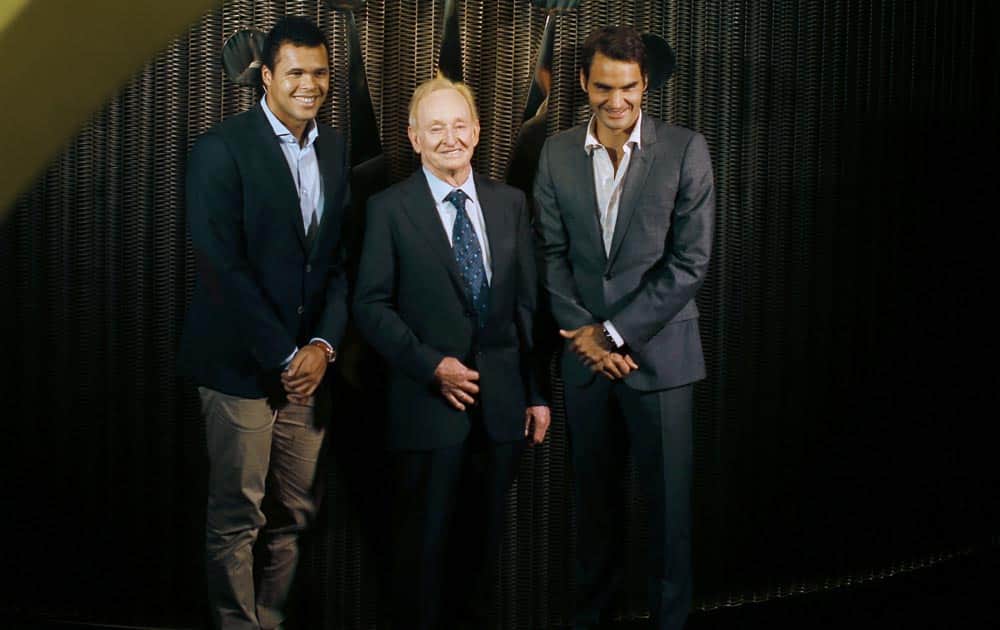 France`s Jo-wilfried Tsonga, Australia`s tennis legend Rod Laver and Switzerland`s Roger Federer pose for photographers during the 2013 Shanghai Masters tournament main draw ceremony in Shanghai, China.