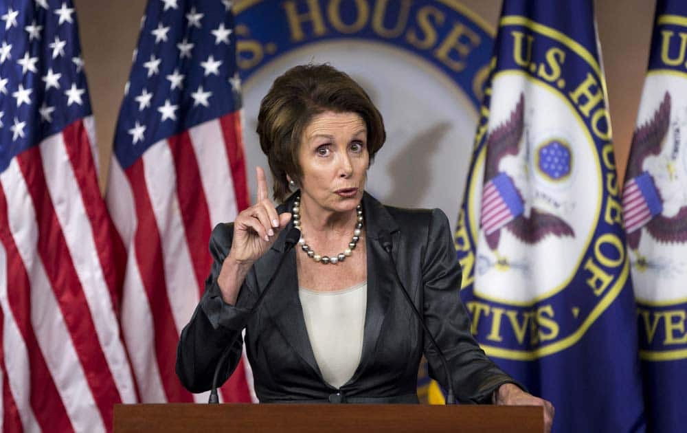 House Minority Leader Nancy Pelosi of Calif. gestures during a news conference about the ongoing budget fight, on Capitol Hill in Washington.