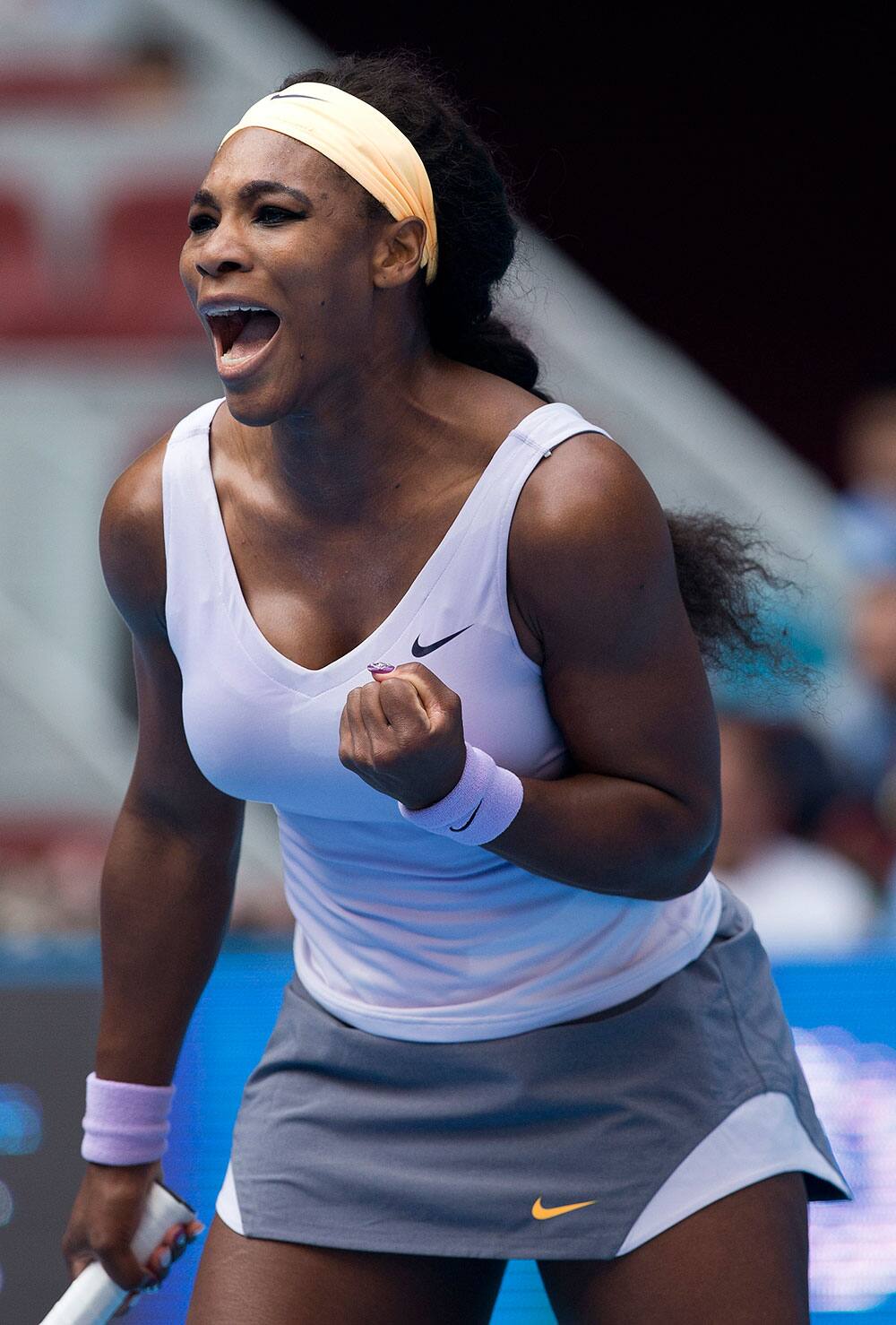 Serena Williams of US celebrates after defeating Maria Kirilenko of Russia during the China Open tennis tournament.