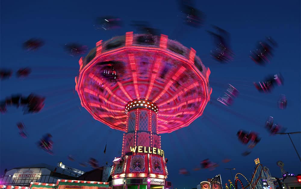 A merry-go-round rotates at the 180th Bavarian
