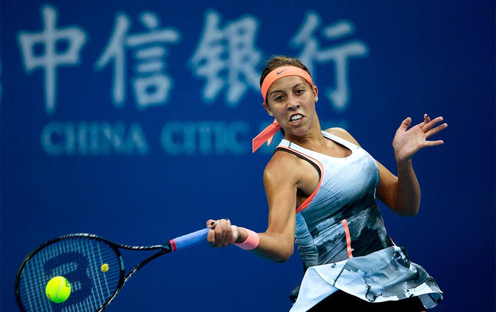 Madison Keys of the US returns a shot to Agnieszka Radwanska of Poland during the China Open tennis tournament.