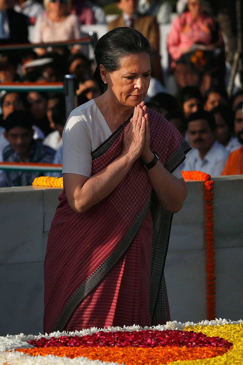 Congress Party President Sonia Gandhi offers prayers at a memorial of Mahatma Gandhi on the occasion of his birth anniversary, in New Delhi.