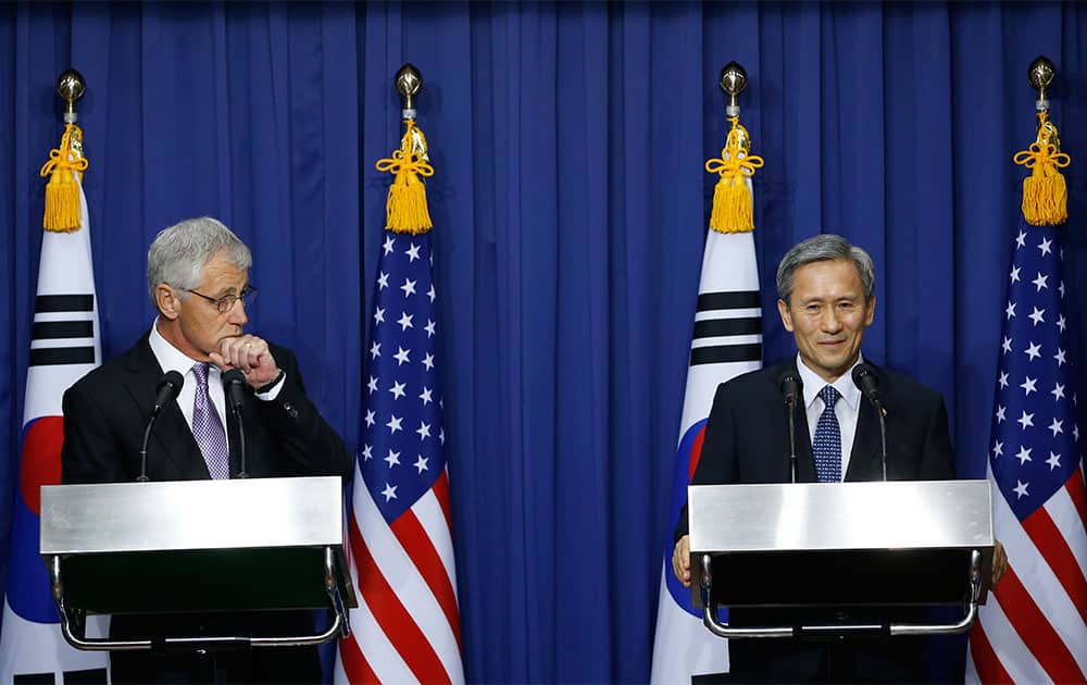 US Secretary of Defense Chuck Hagel, left, and South Korea`s Defence Minister Kim Kwan-jin attend a news conference after the 45th Security Consultative Meeting at the Defense Ministry in Seoul, South Korea.